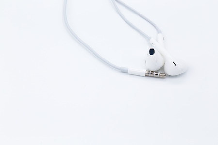 White earbuds isolated on white background