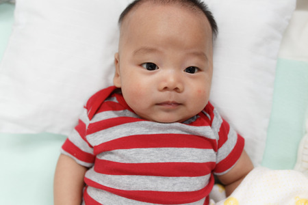 Portrait of adorable newborn babyの写真素材