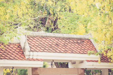 Thai temple roof in Khonkaen, warm retro styleの写真素材