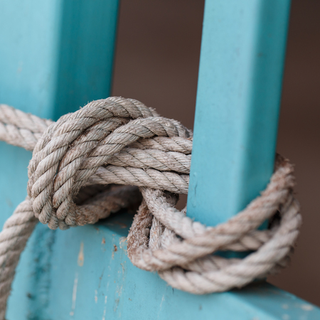 Close up of old rope knotted.の写真素材