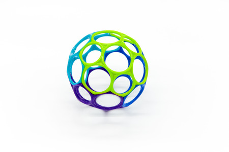 Plastic sphere toy with different size holes