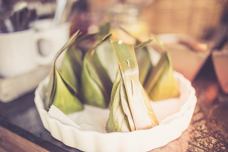Thai dessert, Thai style banana leaf packaging, vintage styleの写真素材