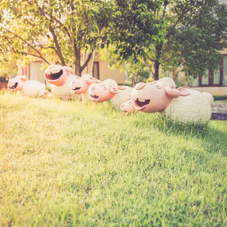 Happy sheep statue in the gardenの写真素材