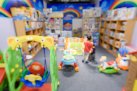 Blurred of kids toy store background with bokehの写真素材
