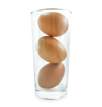 eggs in water drink glassの写真素材
