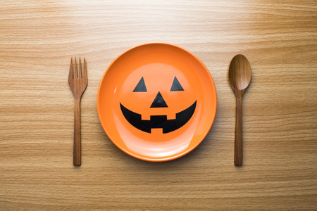 halloween dish with wood spoon and forkの写真素材