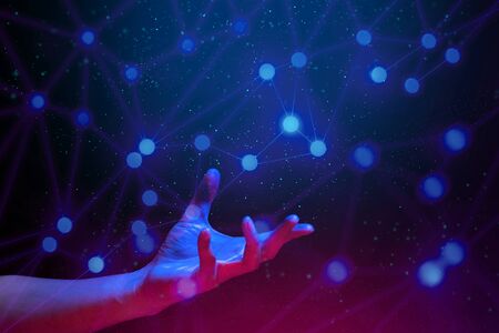 particle with digital data ai global network technology hologram with light and hand of human with...