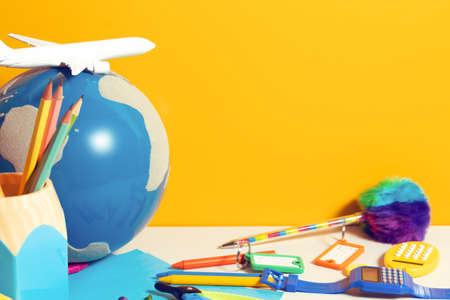 tourist student kids travel and education with earth globe map and airplane toy in back to school conceptの写真素材