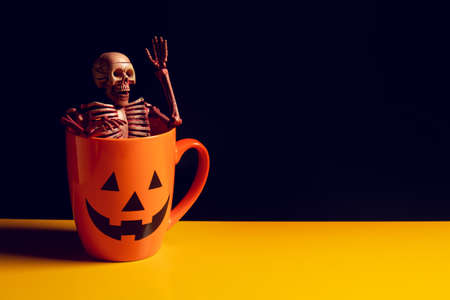 horror spooky funny ghost in halloween skeleton skull on holiday season greeting night celebration...
