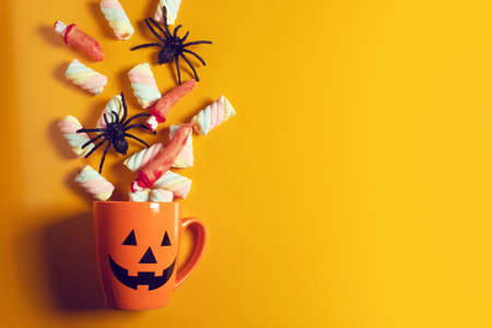 horror spooky funny ghost in halloween pumpkin holiday season greeting night celebration party with...