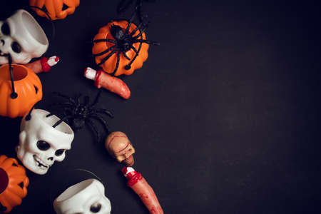 horror spooky funny ghost in halloween pumpkin holiday season greeting night celebration party with toy prop decoration in top view flatlay and trick of treat festival conceptの写真素材