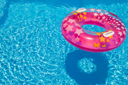 summer party pool water with colorful background, season greating, tour and travelの写真素材