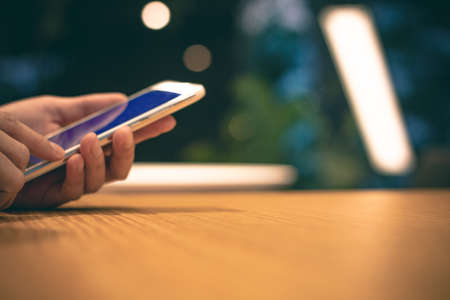 hand finger touch on screen smartphone for connecting to social networkの写真素材