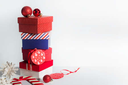 decoration toy with coffee  in season greeting merry christmas prop on red background bokeh lightの写真素材