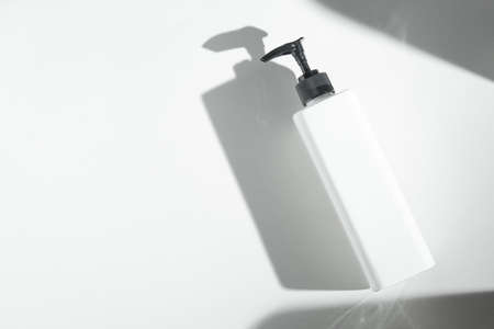 beauty spa medical skincare and cosmetic lotion bottle cream packaging product on white decor background with doctor healthy conceptの写真素材
