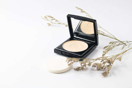 girl fashion beauty cosmetic makeup powder puff pact with mirror and herbal leaf tree on white background, stylist and facial conceptの写真素材