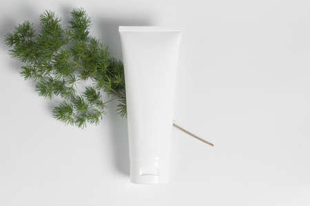 beauty spa medical skincare and cosmetic lotion bottle cream packaging product on white decor background with nature herbal leaf tree extractの写真素材