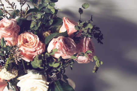blossom vintage flower rose leaf with decoration prop on tableの写真素材