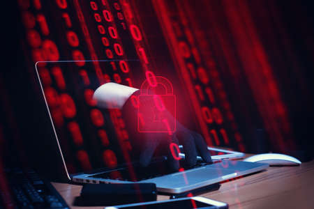 hacker hand in terrorist with virus computer attack robbery to unlock server network system online in data internet, security hacking system conceptの写真素材