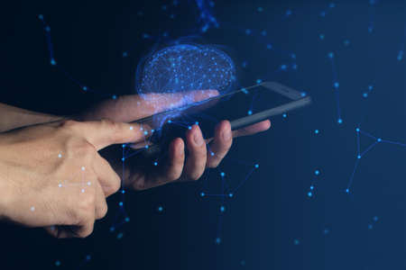 businessman hand finger touch on screen smartphone device for connecting to social network internet digital with data safety security cloud storage ai brainの写真素材