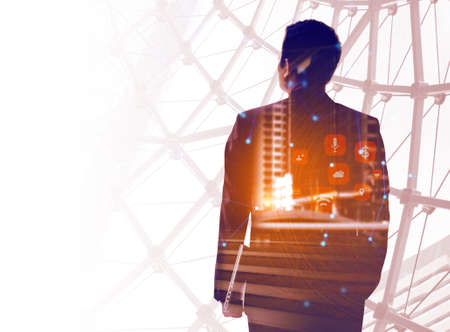 businessman leadership vision with city building of trade risk money financial network technology concept, ai data cloud storage systemの写真素材