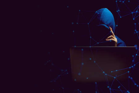 hacker man terrorist with virus computer attack to server network system online in data internet security hacking conceptの写真素材