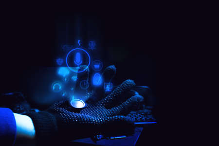 hacker hand glove terrorist with virus computer attack to server network system online in data internet security hacking ai conceptの写真素材