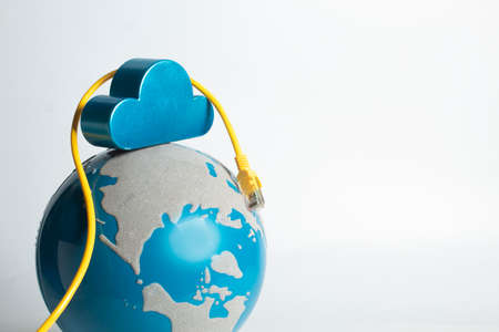 cloud storage with online server wire on globe in network system data technology conceptの写真素材