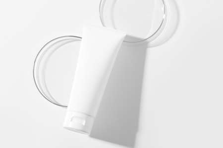 cosmetic mockup cream in bottle pakage with beauty spa treatment with science lab test tubeの写真素材