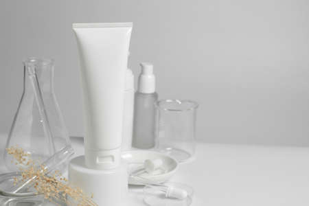 beauty spa medical skincare and cosmetic lotion bottle cream spray packaging product on white decor background with doctor health science laboratory glass testの写真素材