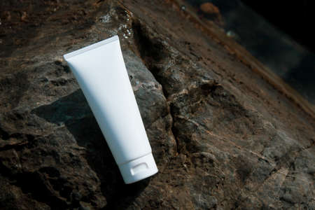 beauty treatment medical skincare and cosmetic lotion cream serum oil mockup bottle packaging product on rock stone nature background, healthcare and medicine conceptの写真素材