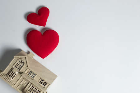 house of happiness family with love red heart decoration in festive holiday season greeting of valentine's day background, gift for wedding lover conceptの写真素材