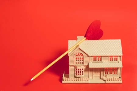 happiness family home with love red heart in holiday season greeting of valentine's day background, house of happy people living lifeの写真素材