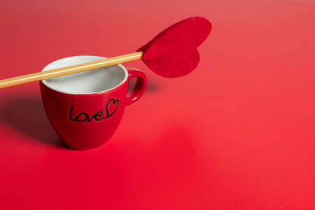 coffee cup and happiness family with love red heart decoration in festive holiday season greeting of valentine's day backgroundの写真素材