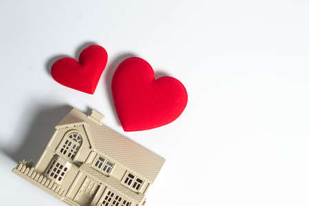 house of happiness family with love red heart decoration in festive holiday season greeting of valentine's day background, gift for wedding lover conceptの写真素材