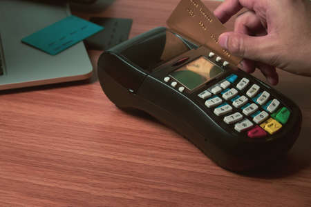 shopping online internet electronic payment device with premium credit card of digital banking investment financial and money business conceptの写真素材