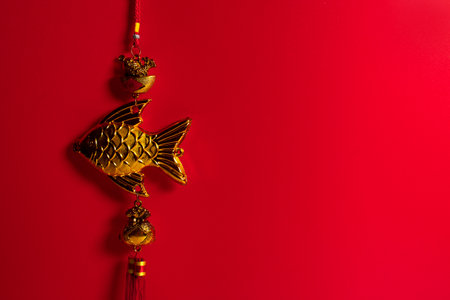 chinese happy new year holiday season greeting festival red background with gold luxury vintage oriental native hanging docoration, traditional happiness event conceptの写真素材