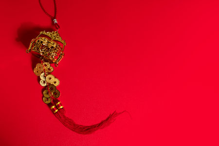 chinese happy new year holiday season greeting festival red background with gold luxury vintage oriental native hanging docoration, traditional happiness event conceptの写真素材