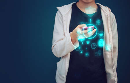 teen girl with social online smartphone network light and blue wall background with data icon, data deep learning, internet of things, online shoping market, ai robotic ui hud 01 codeの写真素材