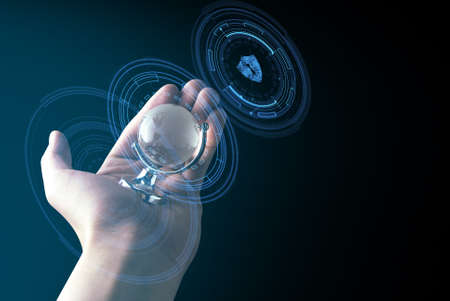 hand hold glass global world on black background with social data cyber safety security internet of...