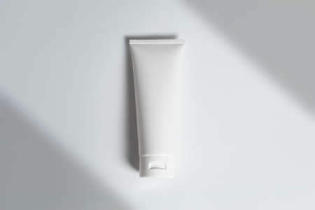 beauty treatment medical skincare cosmetic lotion cream serum mockup bottle packaging product on white decor background in healthcare pharmaceutical medicineの写真素材