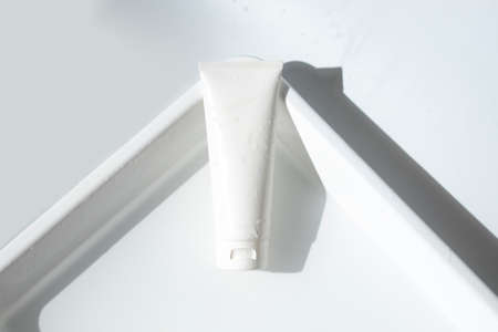 beauty treatment medical skincare and cosmetic lotion cream serum oil mockup bottle packaging product on water splash background in healthcare and medicineの写真素材