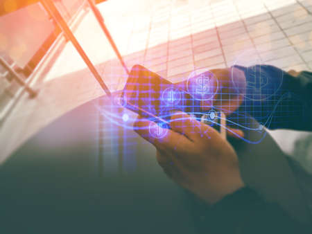 businessman hand finger touch on screen smartphone device for online trading network technology...