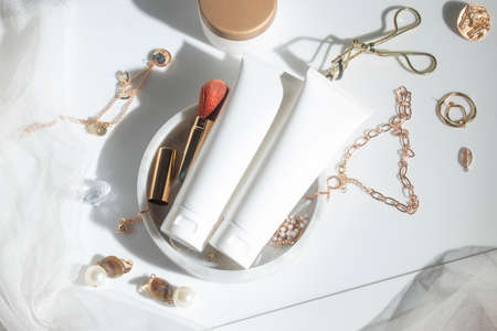 beauty treatment medical skincare cosmetic lotion cream serum mockup bottle packaging product on white decor background in healthcare pharmaceutical medicineの写真素材