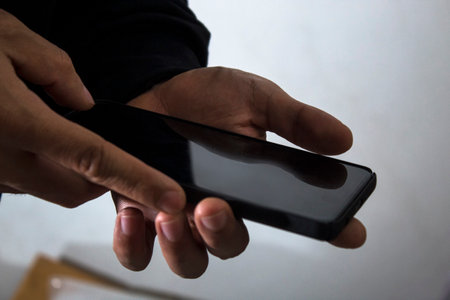 businessman hand finger touch on screen smartphone device for online trading network technology...