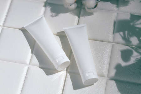 beauty fashion cosmetic makeup bottle lotion cream product mockup with skincare healthcare concept on backgroundの写真素材