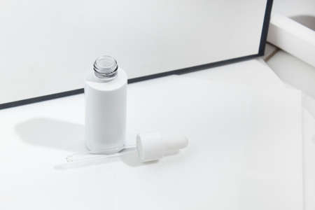 mockup of beauty fashion cosmetic makeup bottle serum dropper product with skincare healthcare...