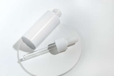 mockup of beauty fashion cosmetic makeup bottle serum dropper product with skincare healthcare...