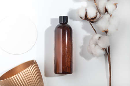 mockup of beauty fashion cosmetic makeup bottle serum dropper product with skincare healthcare concept on backgroundの写真素材