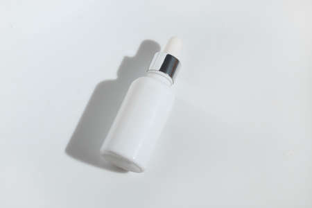 mockup of beauty fashion cosmetic makeup bottle serum dropper product with skincare healthcare...